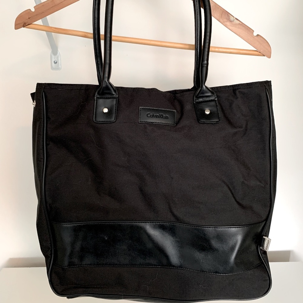 Calvin Klein Black Waterproof Shoulder Bag, can fold in for snap closure